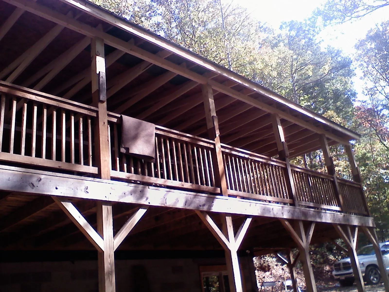 Timber framing under a new elevated porch and deck — Roof Leak Repair in New Durham by Roofing Brothers